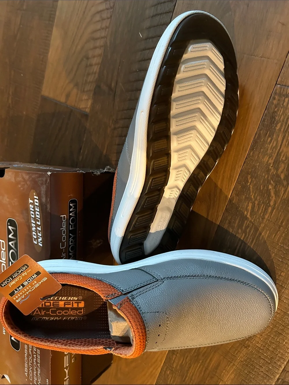 Skechers Men’s Slip-On Loafers in Light Gray with Orange Accents